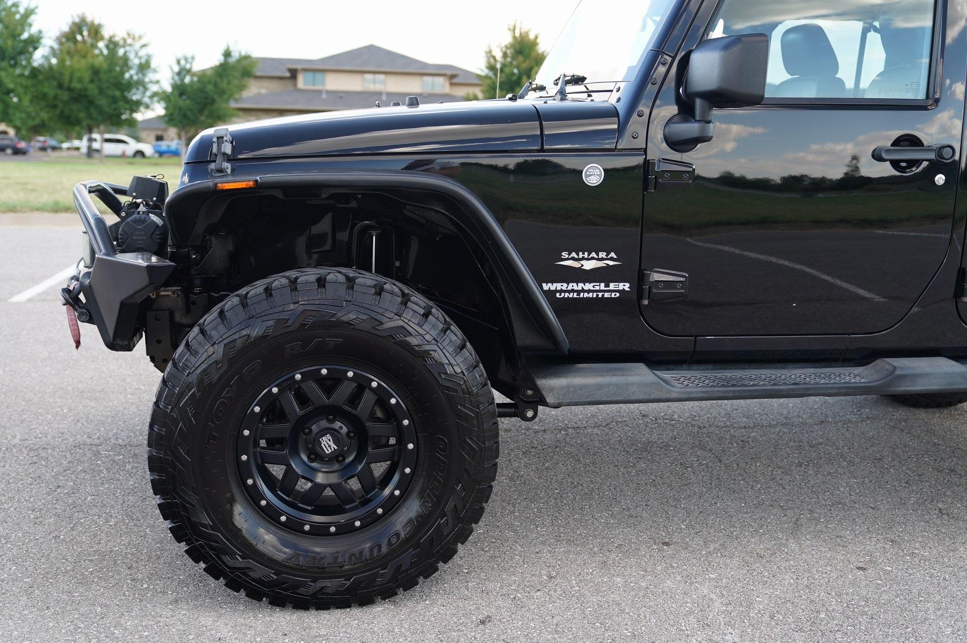 Pre-Owned 2013 Jeep Wrangler Unlimited Sahara Sport Utility in Afton  #UET1401A